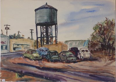 Water tower, old cars